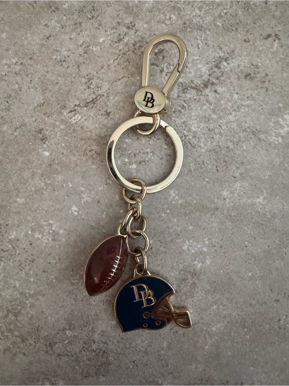 Dooney & Bourke Gold-Tone Keychain with Blue Helmet & Brown Football